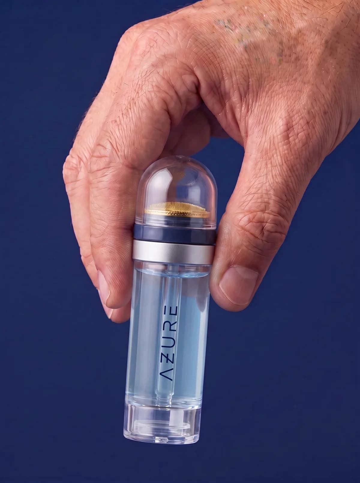 The AZURE applicator held in a hand